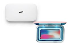an image of a white box with a pink and blue design on the lid next to it