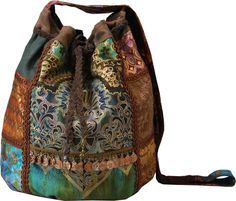 a multicolored bag with an intricate design on the front and side pocket, attached to a lanyard