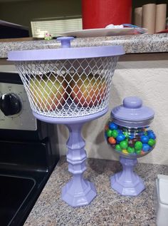 a kitchen counter with a basket filled with candy