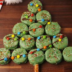 The cutest and easiest Christmas treat to serve this year. Get the recipe at Delish.com. #delish #easy #recipe #oreo #christmas #christmastree #dessert #edible #chocolate #nobake #m&ms #holiday #cookies Christmas Recipes, Easy Christmas Treats, Christmas Tree Food