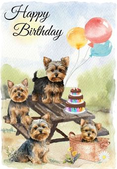 three dogs are sitting on a picnic table with a birthday cake and balloons in the background