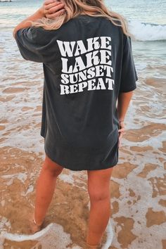 "This comfortable shirt is perfect for any lake lover. It is made from a lightweight and breathable material, making it great for a hot summer day. The shirt also has a unique retro design on the back with a phrase that reads \"Lake Wake Sunset Repeat\". Perfect for any lake enthusiast. ABOUT THE SHIRT Comfort Colors 1717 Unisex Jersey Short Sleeve 100% Ringspun Soft Cotton Fits True To Size Size UP 1-2 Sizes For An Oversized Look RETURN POLICY All items are made to order specially for you! We do not accept returns or exchanges unless the item is printed incorrectly. We want you to love your order, so please be sure to check size charts and ask any questions if you have any!  SHIPPING Items are processed and shipped within five business days of your order. SOCIAL MEDIA Be sure to follow us Shirts, Sweatshirts, Wardrobes, Fashion, Clothes, Tops, Outfits, Cute Outfits, Goals