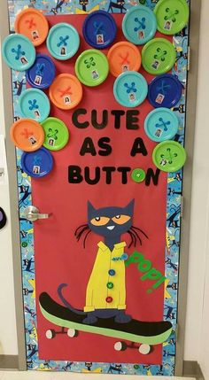 a bulletin board with buttons and a cat on it's front door that says cute as a button