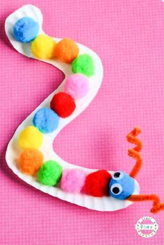 an easy paper plate caterpillar craft for kids to make with the letter s