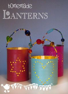 three tin canisters with beaded decorations on them, one is pink and the other is blue