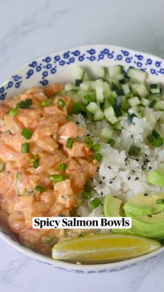 spicy salmon bowl with rice and cucumbers
