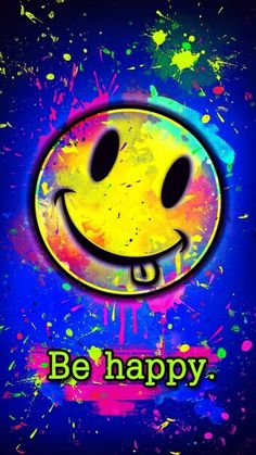 a smiley face with the words be happy painted on it's side and splattered