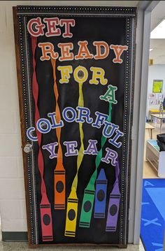 a classroom door decorated with the words get ready for a colorful year