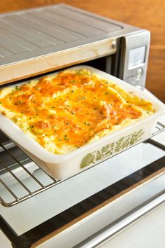 a casserole is being cooked in an oven