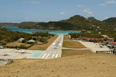an aerial view of the runway and airport