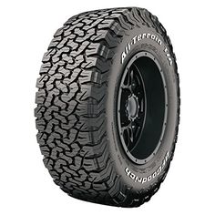 an all terrain tire on a white background