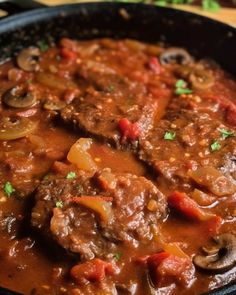 meat and mushroom stew in a skillet ready to be eaten for lunch or dinner