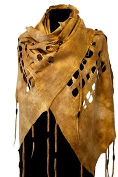 Start with thin wool blanket. cut designs and fringe. Then hot, cold, hot cold water till it's shrunken, (felted). Ponchos, Stricken, Felted Scarves, Scarf, Post Apocalyptic Costume