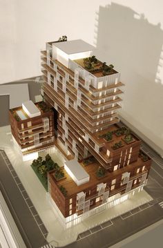 an architectural model of a three story building