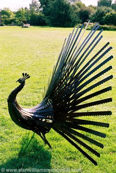 Peacock - Saw blades, chainsaw chain, glass, forged, maybe rakes? Horseshoes, Lawn Art, Metal Art Sculpture
