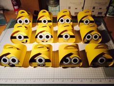 there are many yellow minion faces on the table