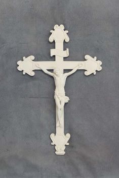 a white crucifix on a gray background