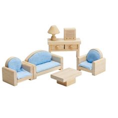 a wooden dollhouse furniture set with blue cushions and matching chair, coffee table and end table