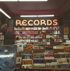 record store with records on display in front of large sign that reads records above it