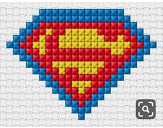 a cross stitch superman symbol in red, yellow and blue