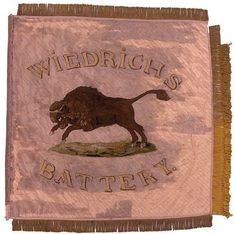 an embroidered wall hanging with a bull and the words wiedrich's battery