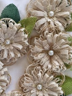several pieces of fabric with flowers on them