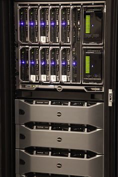 the inside of a server with several servers stacked on top of each other in front of one another