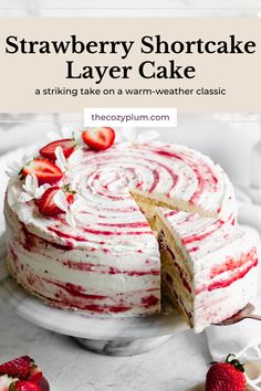 a strawberry shortcake layer cake with a slice cut out