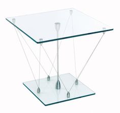 a glass table with two metal legs and one shelf on the bottom is holding three candles
