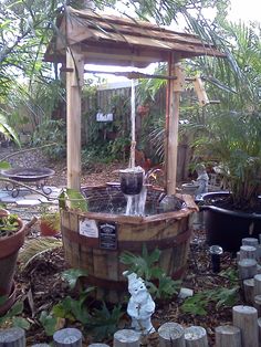 Jack Daniel's distillery barrel, wishing well, fountain Garden Center Displays, Backyard Makeover, Outdoor Decor Backyard, Diy Garden Fountains, Yard Decor