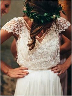 the back of a woman's wedding dress with flowers in her hair and text that reads, industrial celebration in