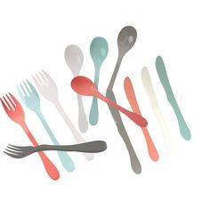 a group of forks and spoons on a white background