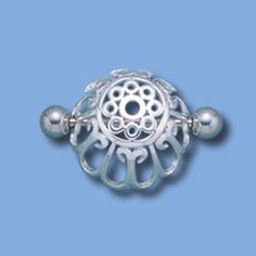 a silver bead on a blue background
