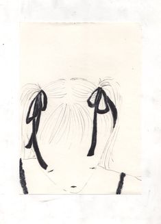a black and white drawing of a woman's face with two bows on her head