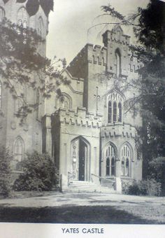 an old black and white photo of a castle