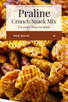 some kind of snack that is in a bowl with the words praline crunch snack mix