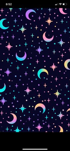 an iphone screen with colorful stars and crescents on it, in the dark blue background