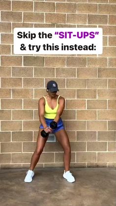 a woman standing in front of a brick wall with a sign that says, skip the sit - ups & try this instead
