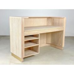a wooden desk with shelves and drawers