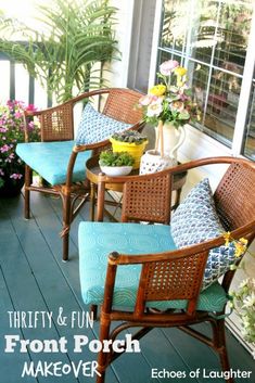 the front porch is decorated with wicker chairs and blue cushions, along with potted plants