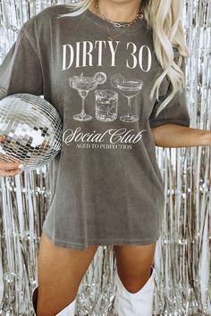 "Celebrate your 30s in style with our fun and trendy \"Dirty 30\" Social Club Cocktail t-shirt! Perfect for a milestone birthday, this trendy tee is designed to capture the spirit of turning 30! DETAILS * Comfort Colors Garment-Dyed Heavyweight T-Shirt * 100% ring spun cotton * Design is printed using DTG technology which uses high-quality water-based inks that are printed directly into the fabric. This means that there may be a slightly faded/vintage look to the design depending on the color an Clothes, Design, Graphic Tees, Outfits, Birthday Outfit For Women, Birthday Outfit