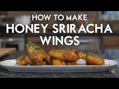 how to make honey sriraca wings on a plate with the words, how to make honey sriraca wings