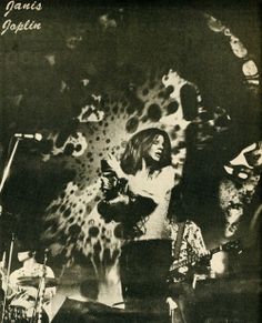 an old black and white photo of a person on stage