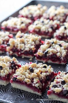 berry crumble bars on a tray ready to be eaten