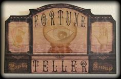 a sign that says fortune teller with two hands on the front and one hand in the middle