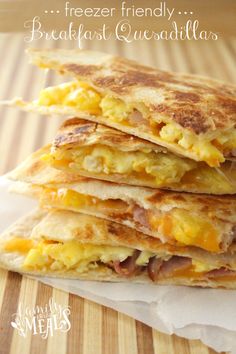 three breakfast quesadillas stacked on top of each other