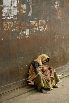 A mother and son homeless on the streets Poor Children, Poor People, People Photography, Poverty Photography, In This Moment, People Around The World