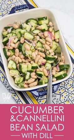 cucumber and cannelli bean salad with dill in a white bowl