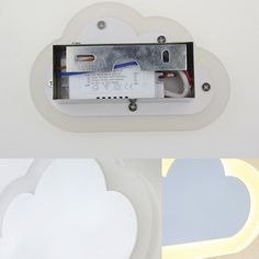 a cloud shaped light fixture is shown in the shape of a heart and has an electrical outlet attached to it