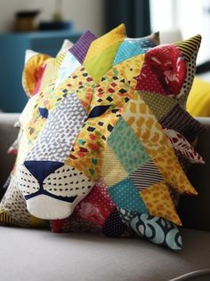 a pillow made to look like a lion head